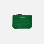 comme des gar ons pocket embossed forest green top zip wallet - KITH-SHOP