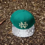 just don university of notre dame logo snapback hat green natural - KITH-SHOP