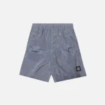 stone island metal nylon mid length garment dyed logo swim shorts in lavender - KITH-SHOP